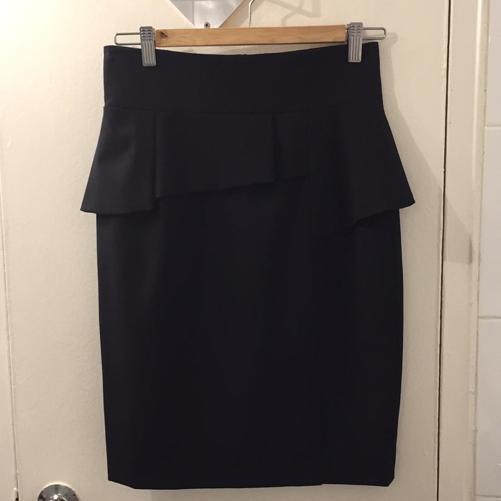 Mid length black skirt